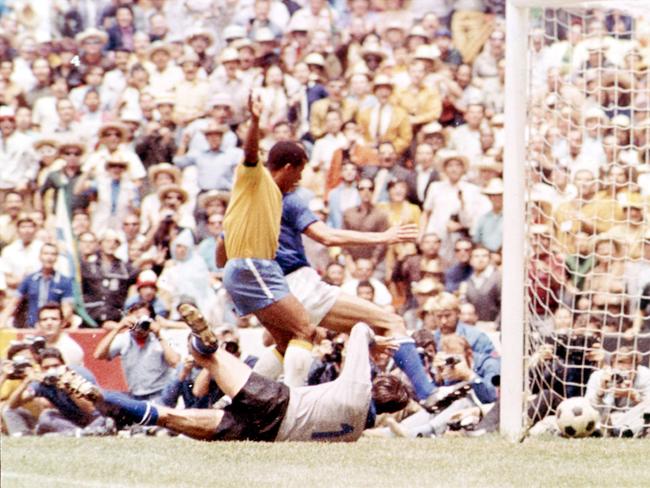 Ventura Filmo Jairzinho, (golden shirt), scores Brazil's third goal in the 1970 final against Italy.