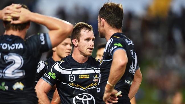 The Cowboys gather behind their tryline during Cronulla’s five-try blitz in the second half last Saturday. 