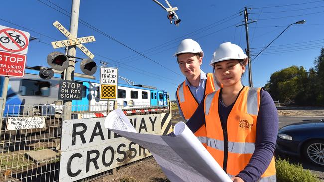 Level Crossing Authority engineers Hazel and Campbell at the Camp Road level crossing. Picture:Tony Gough