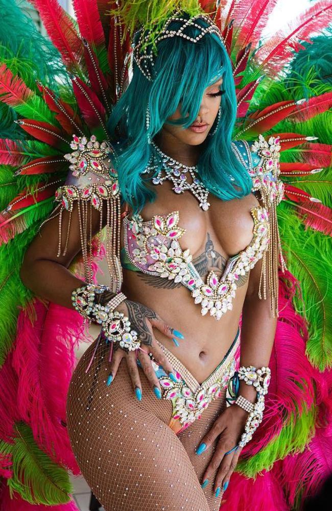 Fans were dubious when Rihanna explained that the extra blue nail attached to her thumb was actually part of her costume. Picture: Instagram