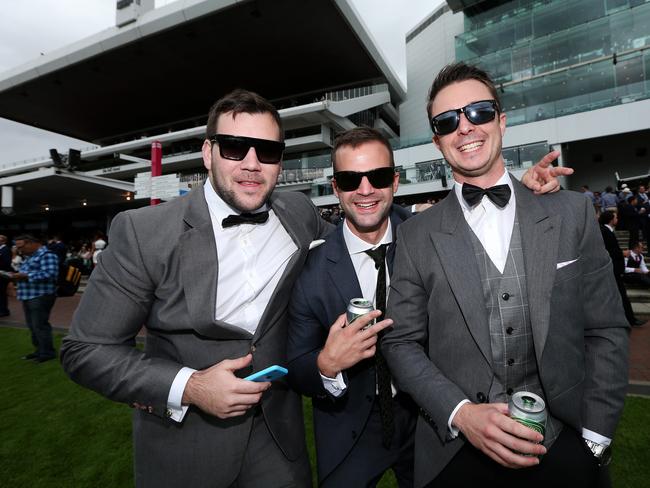 Dean Curnow, Dean Markus and Scott Garner live it up at Derby Day 2014. Picture: Mark Stewart