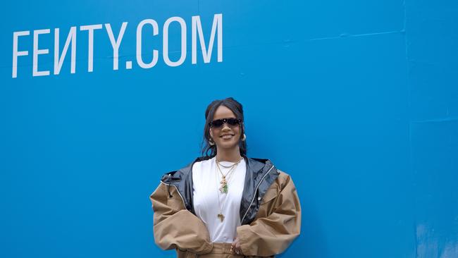 Rihanna promotes Fenty in Paris last month.