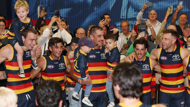 Walker with Louis and Hugo after the win over St Kilda this year. Picture: Sarah Reed/AFL Photos via Getty Images