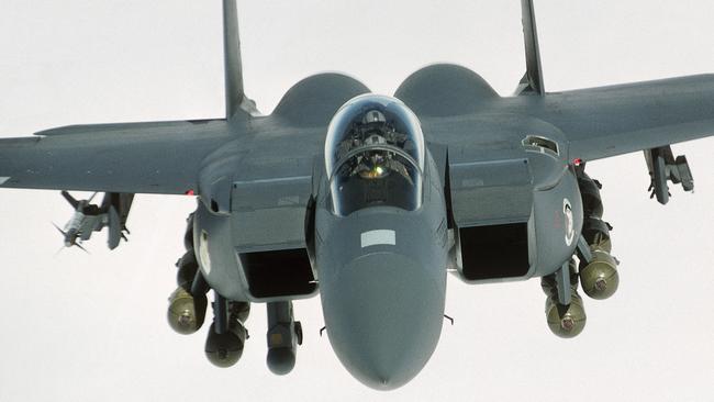 A US Air Force Boeing F-15E Strike Eagle in flight. The US has adapted ground-to-air laser-guided rockets for the F-15Es so they can be employed to destroy Houthi or Iranian drones. The rockets can use the kind of detonator fuzes that had been intended for Ukraine. Picture: Universal Images Group via Getty Images