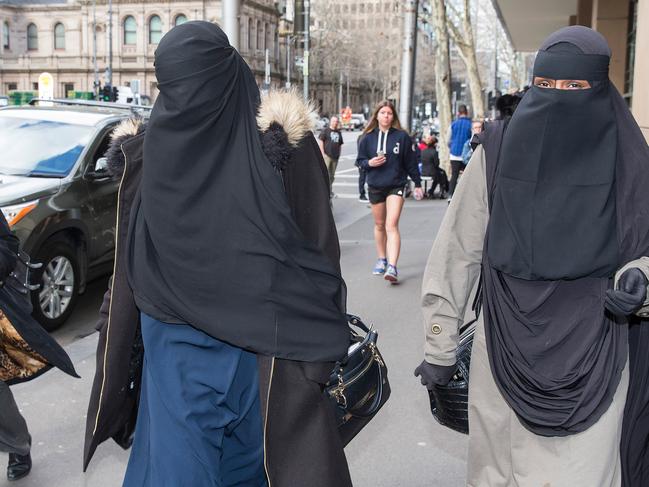 Muslim women have refused to stand for the judge during the terror plot case at the Melbourne Magistrate's Court.Photograph by Paul JeffersThe Australian23 Aug 2017