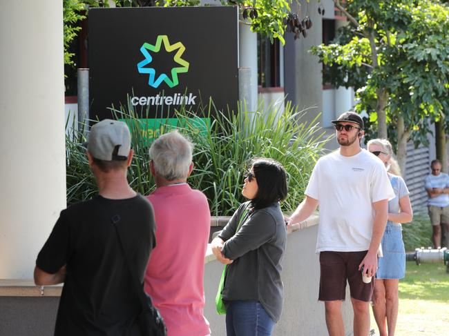 The queue outside Southport Centrelink at 8.40am this morning. Picture Glenn Hampson