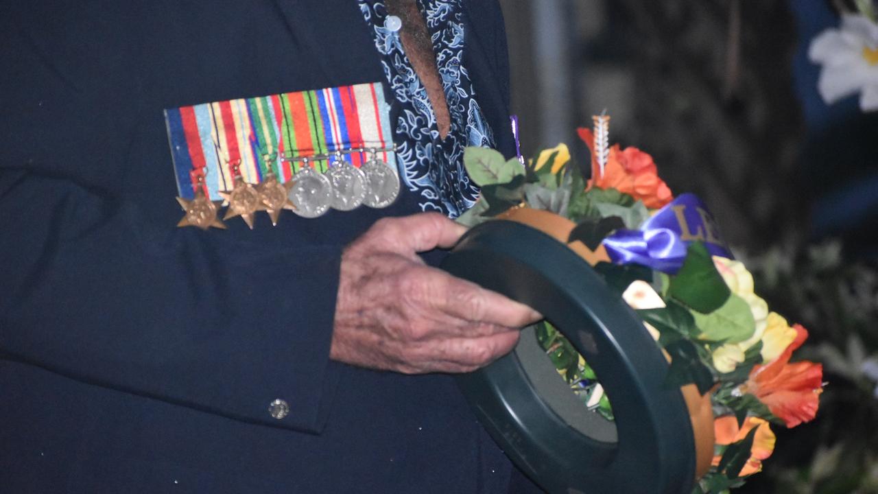 A veteran laying a wreath at the Kuttabul dawn service at the Hampden State School Remembrance Garden 2021. Picture: Lillian Watkins