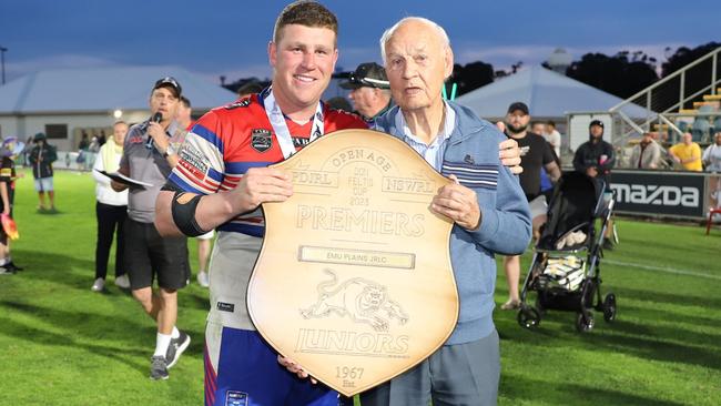 Thomas Romer captain for Emu Plains holds the Don Feltis Shield with Don Feltis, Open Menâs Division 1, Penrith and District Junior Rugby League, grand final, Emu Plains v Windsor Wolves , 2023. Picture: Steve Montgomery