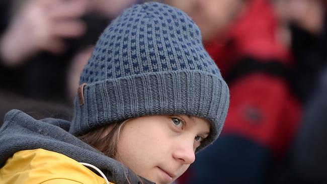 Swedish climate activist Greta Thunberg arrives to takes part at a Friday for Future strike on climate emergency in Turin, Italy on Friday. Picture: AFP