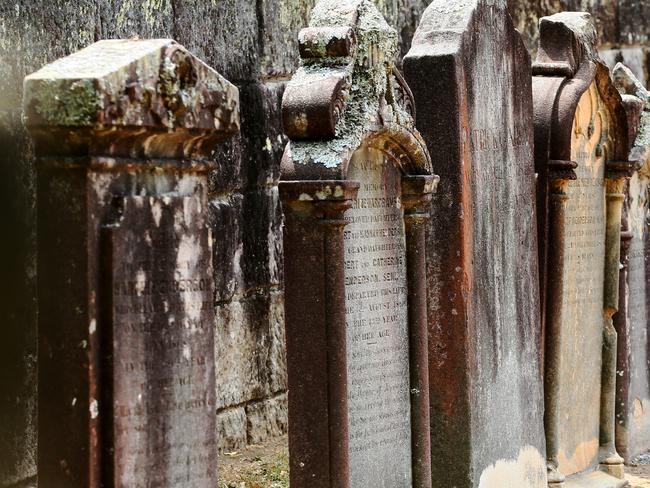 The historic graveyard at Saratoga was enclosed by a stone wall in 1968. Picture: AAP Image