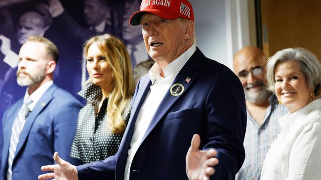 Melania Trump removed her sunglasses for a short space while Donald Trump thanked his staff at his campaign headquarters in West Palm Beach, Florida, on election day. Picture: Getty Images via AFP