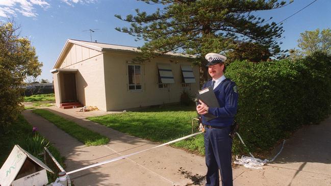 SA police officer Greg Merrett at the home of Franco Murat.