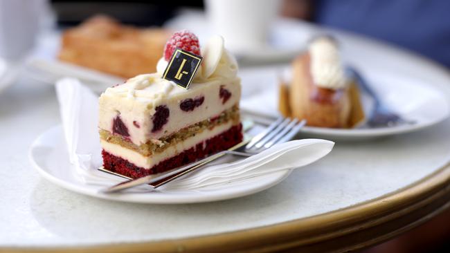 Coffee and cakes were the choice for the busy Archbishop. Picture: Steve Pohlner