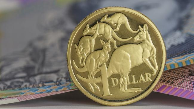 Australian $1 coin and notes close-up, investing, generic