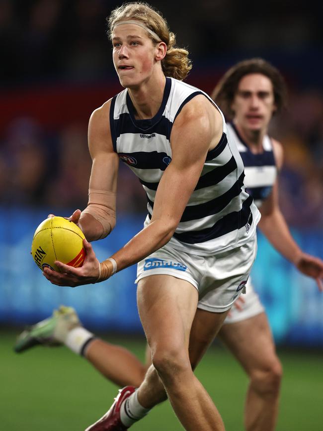 Sam De Koning fires off a handball. Photo by Michael Klein