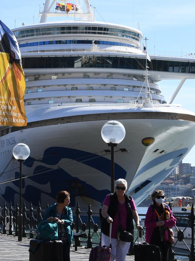 Cruise ship passengers disembark from the Princess Cruises owned Ruby Princess at Circular Quay in Sydney. Picture: AAP