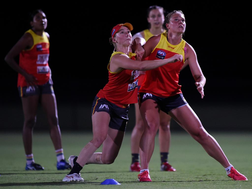 Charlie Rowbottom and Daisy D'Arcy during a Gold Coast Suns AFLW training session at Metricon Stadium Ovals on November 10, 2021 in Gold Coast, Australia. (Photo by Matt Roberts/AFL Photos)