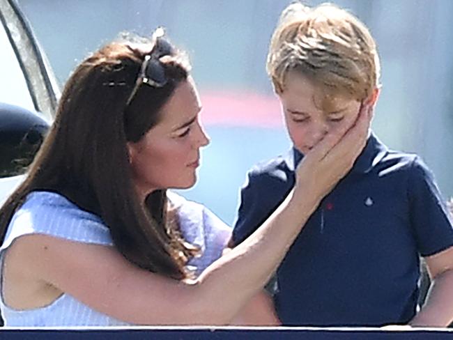 Catherine, Duchess of Cambridge, comforts Prince George. Picture: James Whatling/Mega