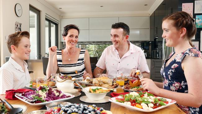 Rebecca and Blake Fischer with their kids Logan and Chloe. Picture: Richard Dobson