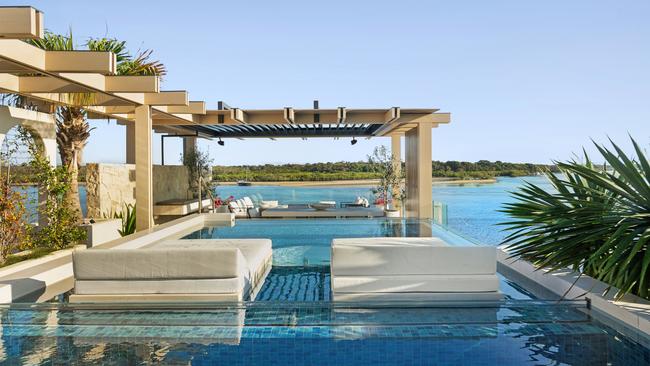 The rooftop pool overlooking the river