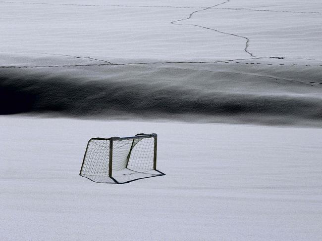 A goal stands on a snow covered football pitch in Untrasried, southern Germany. Picture: AFP