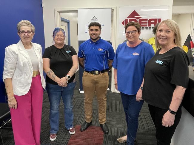 Cr Fran Mann, Dee Chapman of the Youth Information Referral Service accept a $100,000 donation from Melissa Holmes &amp; Denzel Bobongie at Ideal Placement. Photo: Fergus Gregg