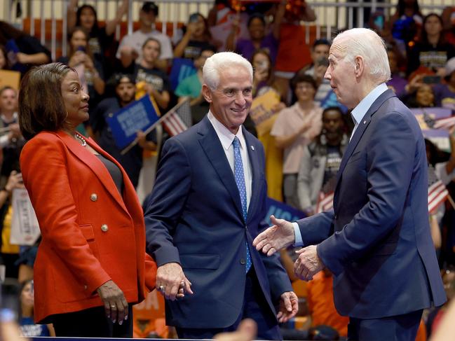 MIAMI GARDENS, FLORIDA - NOVEMBER 01: U.S. President Joe Biden stands with U.S. Senate candidate Val Demings and gubernatorial candidate Charlie Crist at a rally at Florida Memorial University on November 01, 2022 in Miami Gardens, Florida. Biden was campaigning for the two ahead of the November 8 general election.   Joe Raedle/Getty Images/AFP