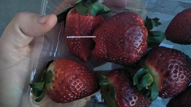 An image posted on Facebook from a shopper claiming to have found a needle in strawberries bought from a Hobart supermarket.