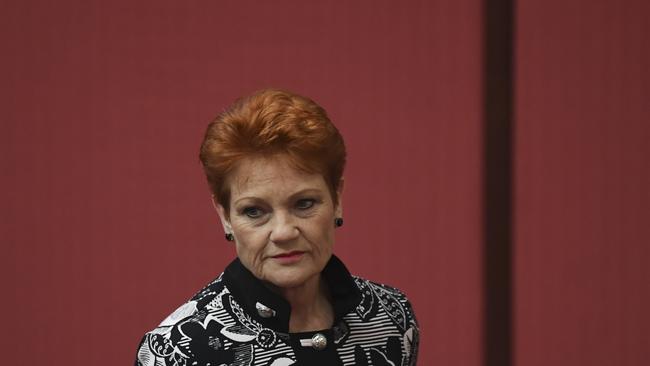 One Nation party leader Pauline Hanson reacts after Australian Communications Minister Mitch Fifield made a statement to the Senate in the Senate chamber at Parliament House in Canberra, Monday, October 15, 2018.  (AAP Image/Lukas Coch) NO ARCHIVING