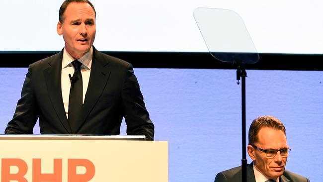 BHP chairman Ken MacKenzie, left, addresses shareholders, alongside CEO Andrew Mackenzie. Pic: AAP