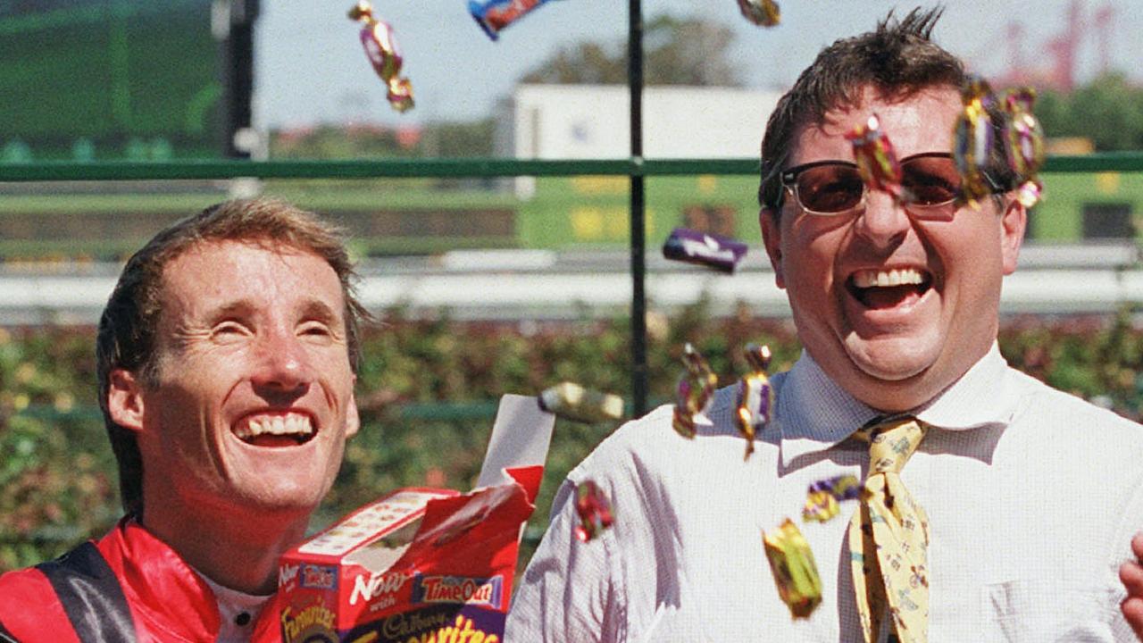 Lee Freedman and Damien Oliver celebrating with Lee Freedman after winning the Cadbury (Australian) Guineas in 2001.