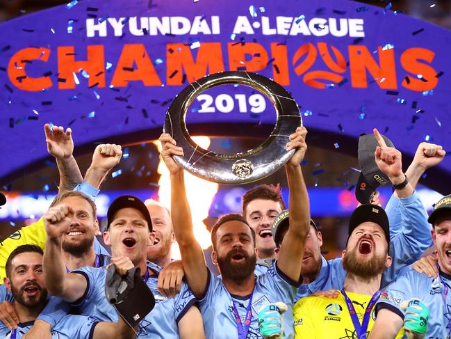 PERTH, AUSTRALIA - MAY 19: Alex Brosque of Sydney FC and team mates celebrate winning the 2019 A-League Grand Final match between the Perth Glory and Sydney FC at Optus Stadium on May 19, 2019 in Perth, Australia. (Photo by Cameron Spencer/Getty Images)