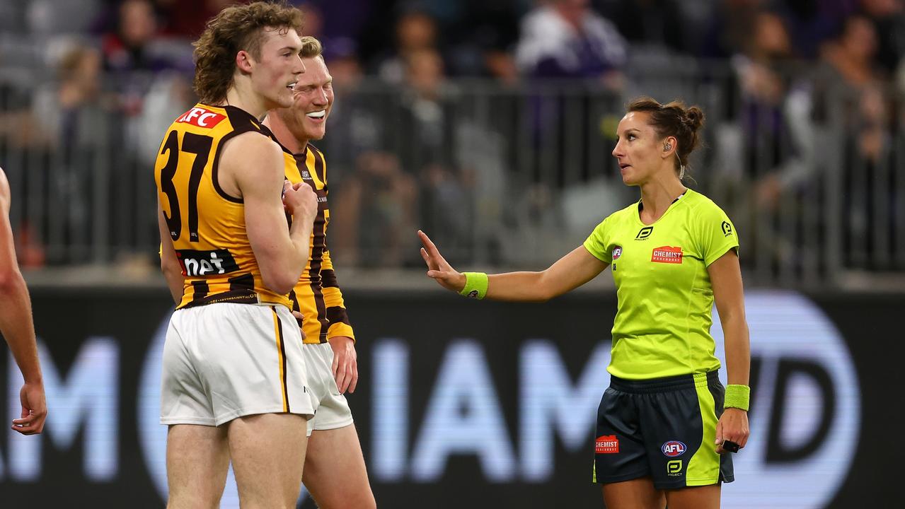 AFL Field Umpire, Eleni Tee talks with James Sicily. Picture: Paul Kane