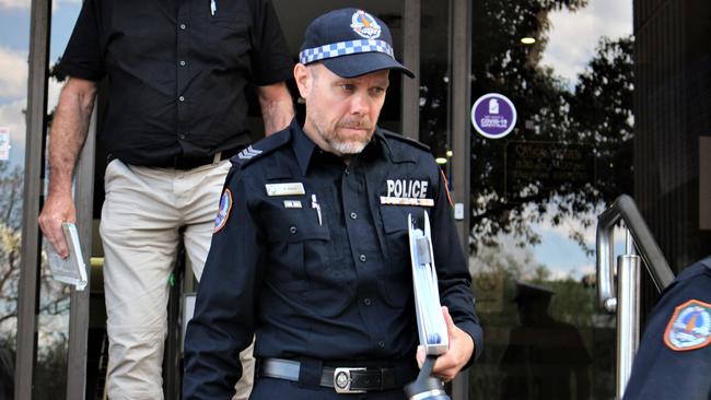 Sergeant Chris Hand leaves the Alice Springs Local Court after giving evidence at an inquest into the death of Kumanjayi Walker. Picture: Jason Walls