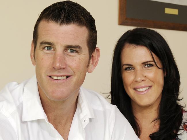 STM ONLY Army Corporal Ben Roberts Smith ( Roberts-Smith ) VC with wife Emma at home (Painting of Army patrol in Afghanistan and T&I flag from Ben's time in East Timor on wall behind)  Ben received the VC for bravery in 2010. REPORT Gail Williams PIC Karin Calvert