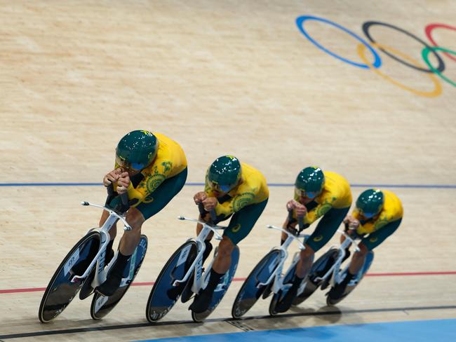 Australia's Oliver Bleddyn, Australia's Sam Welsford, Australia's Conor Leahy and Australia's Kelland O'brien compete to break the world recors during the men's track cycling team pursuit first round of the Paris 2024 Olympic Games at the Saint-Quentin-en-Yvelines National Velodrome in Montigny-le-Bretonneux, south-west of Paris, on August 6, 2024. (Photo by Thomas SAMSON / AFP)