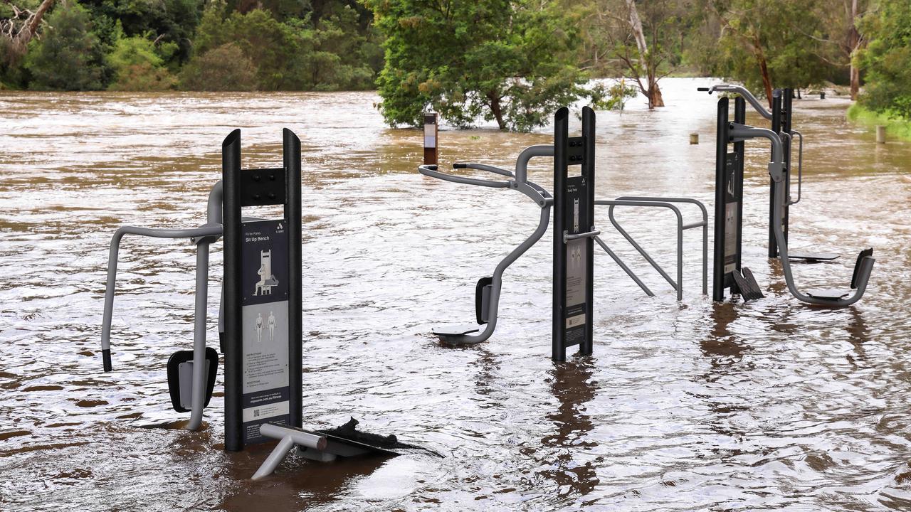 An exercise machine floating down the Yarra river during the recent floods in Victoria. Picture: Ian Currie