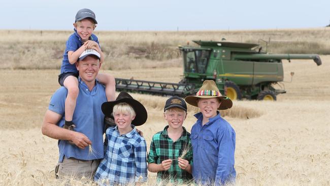 Farmer Mathew Koch on his SA farm with his children Kelley, twins Mitchell and Riley and Jesse. Picture: Emma Brasier