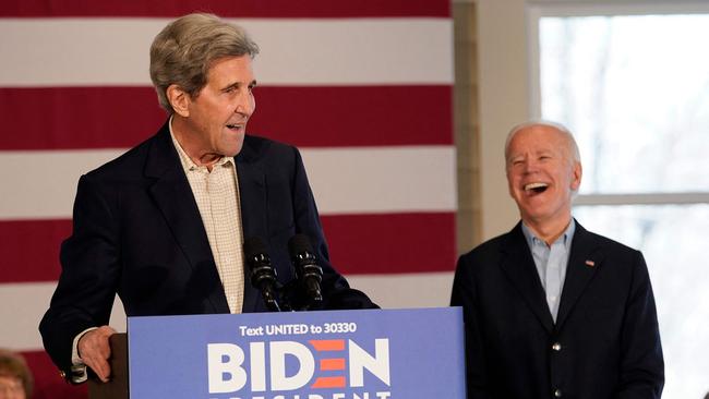 Joe Biden, left, campaigns with former Democratic presidential candidate John Kerry in 2019. Picture: AFP