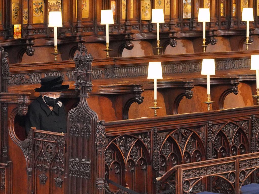 The Queen cut a solitary figure inside St George's as she bade farewell to her husband of 73 years. Picture: Supplied