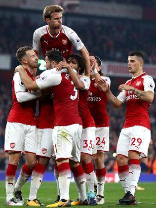 Arsenal celebrate a goal.