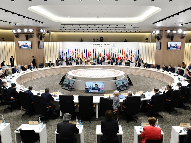 OSAKA, JAPAN - JUNE 29: Shinzo Abe, Japan's prime minister (C) speaks during the session 3 at the G20 summit on June 29, 2019 in Osaka, Japan. (Photo by Kazuhiro Nogi - Pool/Getty Images)