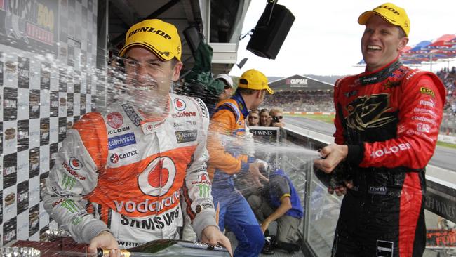 Jamie Whincup and Garth Tander after the 2012 Adelaide 500. Picture: Mark Horsburgh/EDGE Photographics