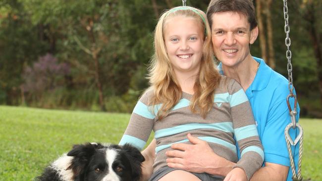 Dr James Moir pictured with his daughter Hannah, 11yo, and dog Bowie on September 5, 2008. Picture: Nicholas Falconer.