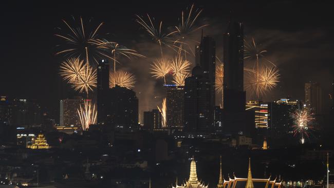 Fireworks explode among the skycrapers in Bangkok. Picture: Getty Images