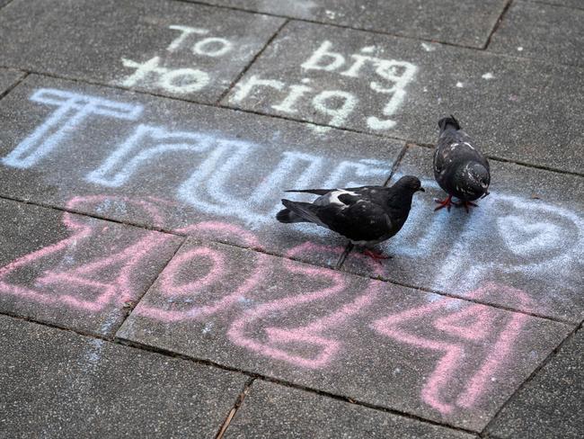 A pro-Trump message is displayed on the sidewalk outside of the Manhattan Criminal Court building. Picture: AFP