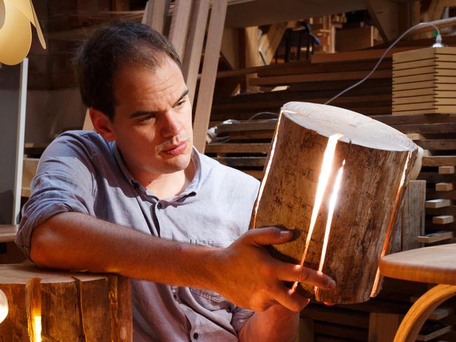 Furniture and lighting designer/maker Duncan Meerding with some of his work at his  workshop in Hobart ,Tasmania.Tues 1/03/2016picture - Peter Mathew