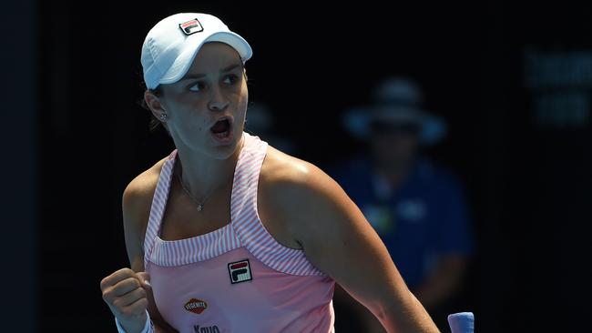 Ash Barty scored a fighting win over Maria Sharapova. (Photo by Greg Wood / AFP)