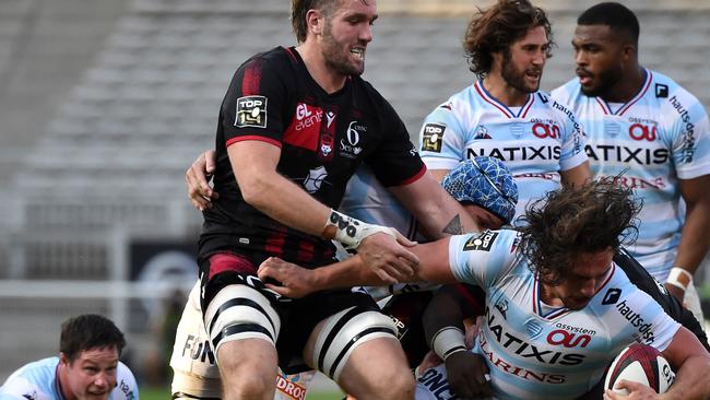 Lyon's Australian lock Izack Rodda (left) vies with Racing's French hooker Camille Chat during the French Top 14 rugby union match in Lyon this week. Picture: Jean-Philippe Ksiazek/AFP