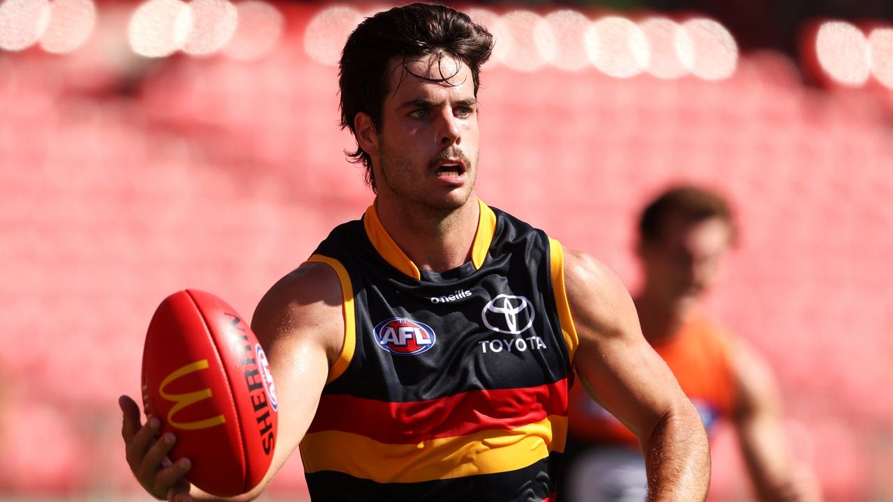 SYDNEY, AUSTRALIA - MARCH 19: Darcy Fogarty of the Crows runs with the ball during the round one AFL match between Greater Western Sydney Giants and Adelaide Crows at GIANTS Stadium, on March 19, 2023, in Sydney, Australia. (Photo by Mark Kolbe/Getty Images)